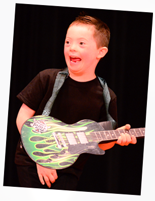 Boy with Guitar - Moving Miracles